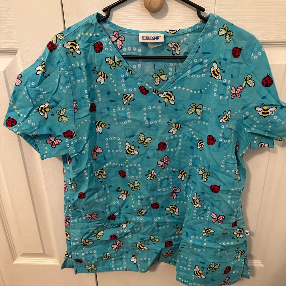 Spring butterfly scrub top